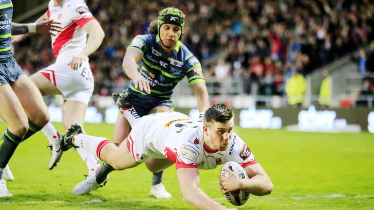 Joe Greenwood  breaks through the tackle of Leeds Ashton Golding to score