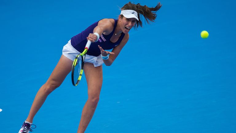 Johanna Konta of Britain serves against Agnieszka Radwanska of Poland during the women's singles final of the China Open tennis tournament in Beijing on Oc