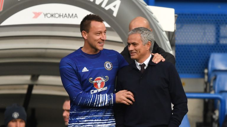 John Terry of Chelsea greets Jose Mourinho, Manager of Manchester United prior to the Premier League match between Chelsea and Man Utd