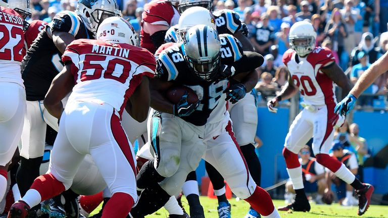 CHARLOTTE, NC - OCTOBER 30:  Jonathan Stewart #28 of the Carolina Panthers runs for a touchdown against the Arizona Cardinals in the 1st quarter during the