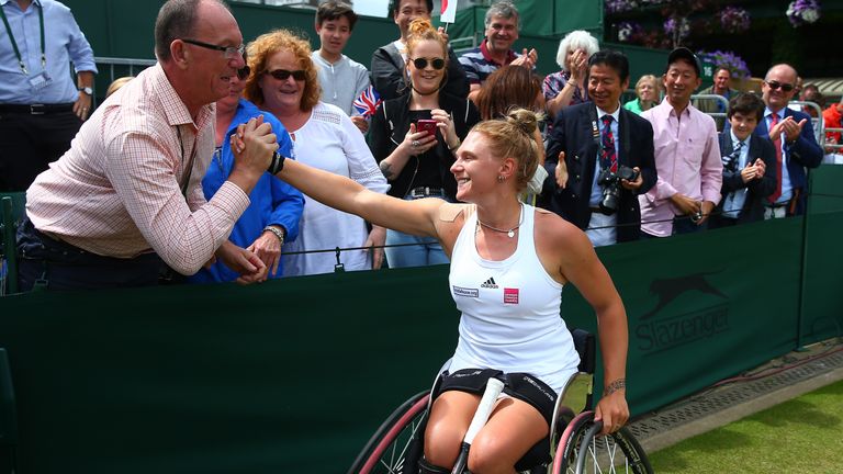 LONDON, ENGLAND - JULY 10:  Jordanne Whiley of Great Britain (partner of Yui Kamiji of Japan) celebrates victory with supporters during the Ladies Doubles 
