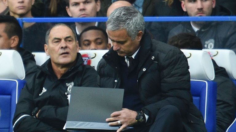 Manchester United's Jose Mourinho makes notes 