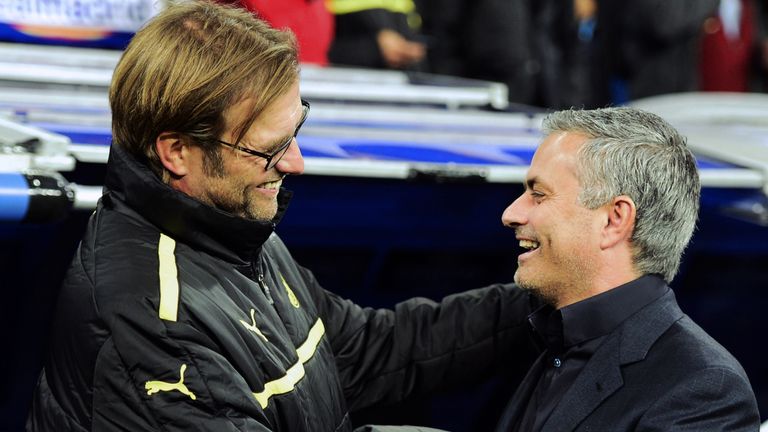 Borussia Dortmund's head coach Jurgen Klopp (L) greets Real Madrid's Portuguese coach Jose Mourinho (R) 
