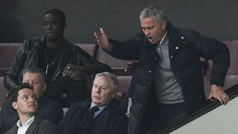 Manchester United manager Jose Mourinho (R) gestures and shouts in the Directors Box after being sent to the stands