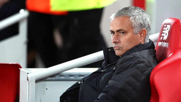 Jose Mourinho looks on from his seat during the Premier League match at Anfield,