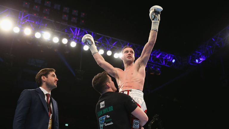 MANCHESTER, ENGLAND - FEBRUARY 27:  Josh Taylor celebrates after victory over Lyes Chaibi in the Super-Lightweight Contest at Manchester Arena on February 