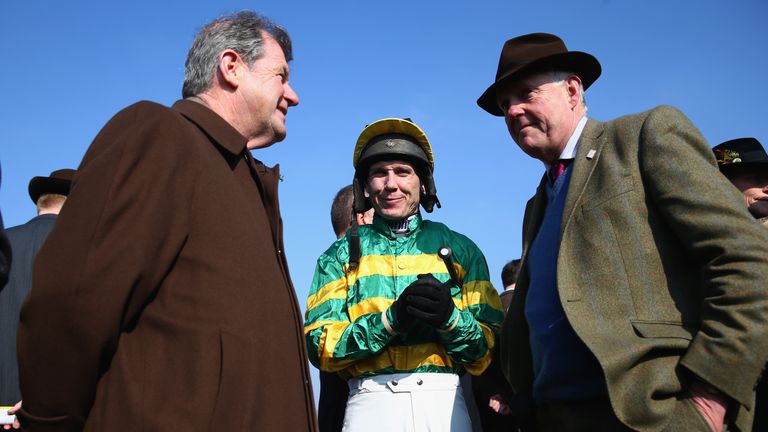 Richard Johnson in conversation with trainer Philip Hobbs (R) and owner JP McManus