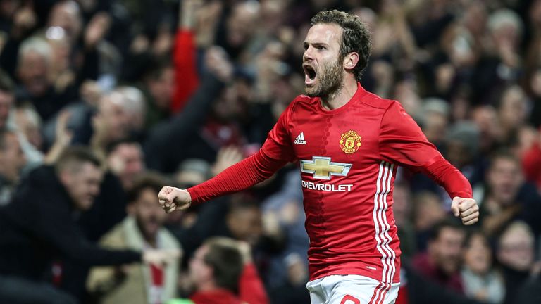 Juan Mata celebrates scoring the only goal of the game in the EFL Cup tie against Manchester City