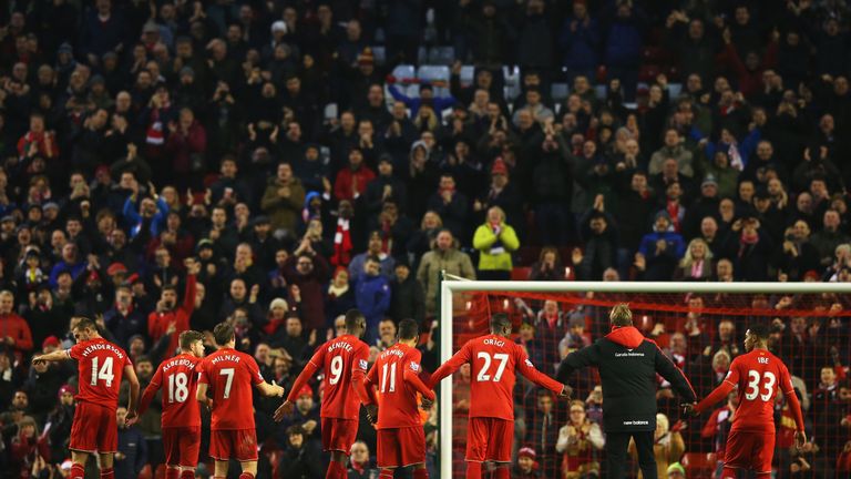 Jurgen Klopp and his Liverpool players salute The Kop after a 2-2 draw with West Brom last season
