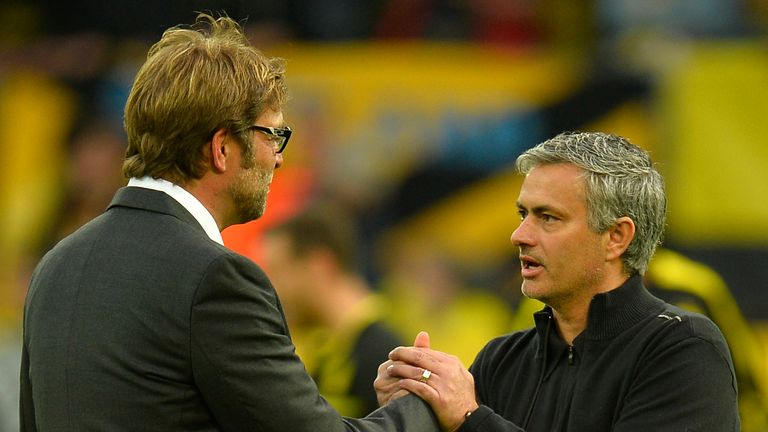 Dortmund's head coach Jurgen Klopp is greeted by Real Madrid's Portuguese coach Jose Mourinho 