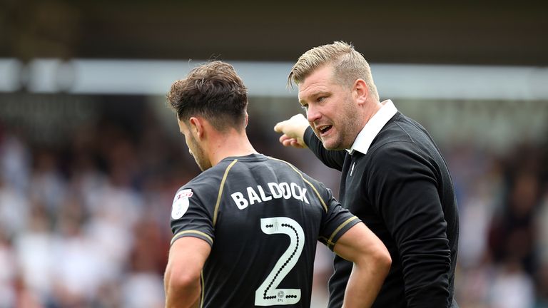 Karl Robinson's MK Dons play host to Port Vale in Sky Bet League One