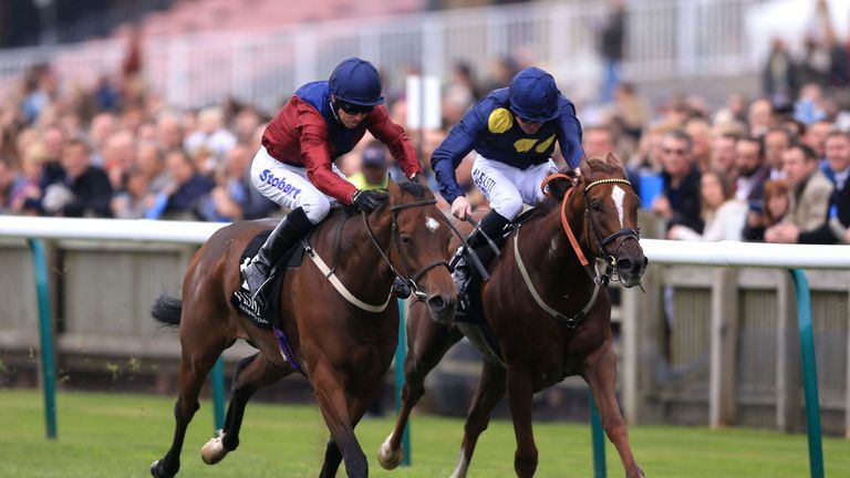 Kassia (left) ridden by Graham Lee wins the visionsport.com EBF Stallions Boadicea Fillies Stakes at Newmarket