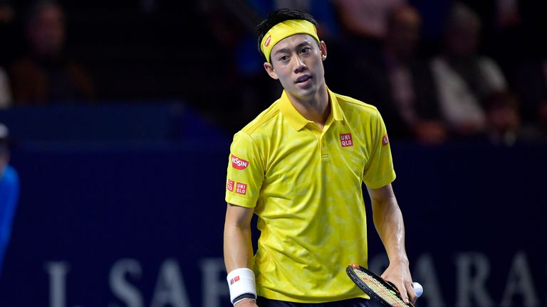 Kei Nishikori of Japan looks dejected as he misses a point during the Swiss Indoors ATP 500 tennis tournament final match