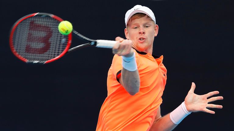 Kyle Edmund returns a shot from Roberto Bautista Agut the China Open