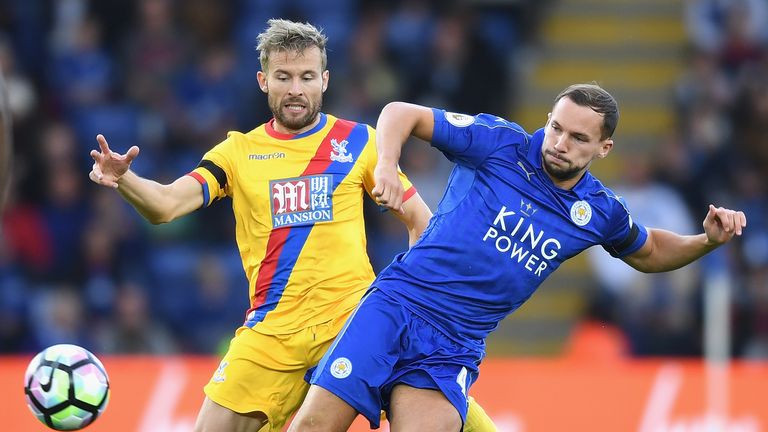 Yohan Cabaye of Crystal Palace (L) puts pressure on Leicester's Daniel Drinkwater 