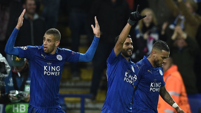 Islam Slimani celebrates with Leicester goalscorer Riyad Mahrez 