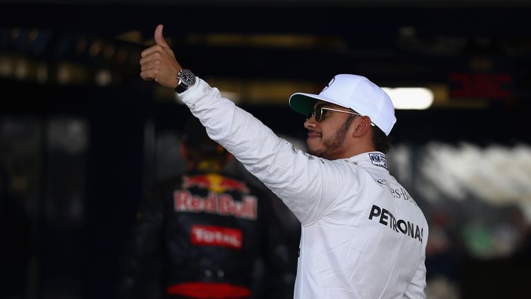 MEXICO CITY, MEXICO - OCTOBER 29:  Lewis Hamilton of Great Britain and Mercedes GP waves to the crowd in parc ferme after qualifying in pole position durin