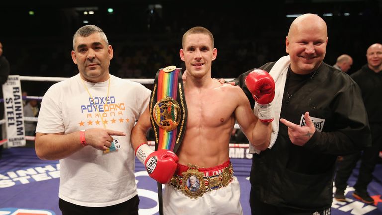 LONDON, ENGLAND - APRIL 30:  Liam Walsh (centre) celebrates victory over Troy James with his cornermen after the British and Commonwealth Super Featherweig