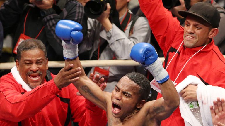 Liborio Solis of Venezuela celebrates after beating Daiki Kameda of Japan during their IBF Super Flyweight /WBA World Super Fly title