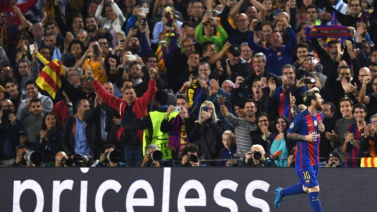 Lionel Messi celebrates in front of fans after scoring Barcelona's second goal of the game