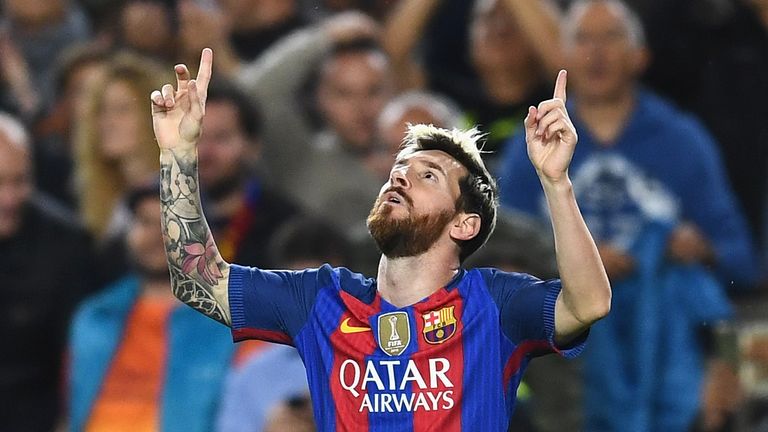 Lionel Messi celebrates scoring the opening goal