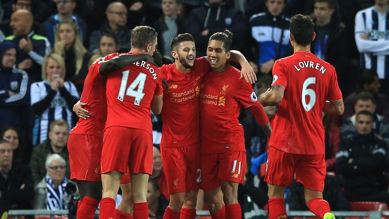 LIVERPOOL, ENGLAND - OCTOBER 22: Philippe Coutinho of Liverpool (Not pictured) celebrates scoring his sides second goal with his team mates during the Prem