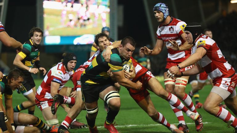 Louis Picamoles of Northampton charges up-field for their first try 