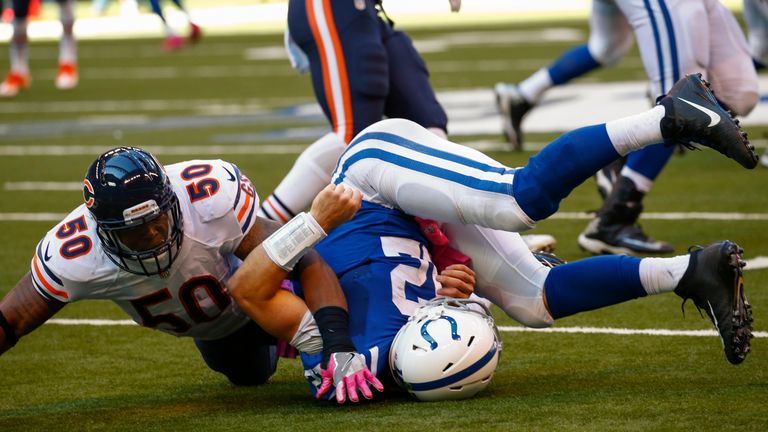 INDIANAPOLIS, IN - OCTOBER 09: Jerrell Freeman #50 of the Chicago Bears was called for roughing the passer on Andrew Luck #12 of the Indianapolis Colts at 