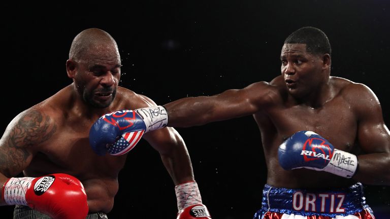 Luis Ortiz (right) exchanges punches with Tony Thompson in their main event heavyweight match at the DC Armory on March 5, 2016 