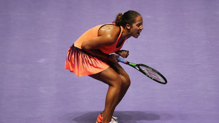 SINGAPORE - OCTOBER 25:  Madison Keys of the United States celebrates victory in her singles match against Dominika Cibulkova of Slovakia during day 3 of t
