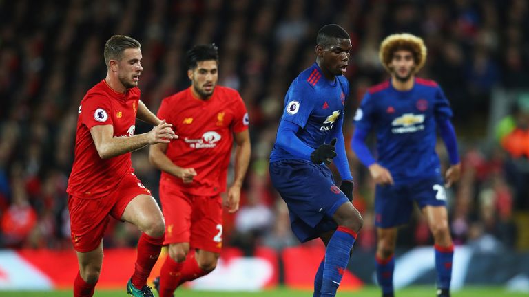 LIVERPOOL, ENGLAND - OCTOBER 17:  Paul Pogba of Manchester United is closed down by Jordan Henderson of Liverpool during the Premier League match between L