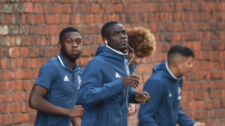 Manchester United squad warm up outside the Titanic Hotel before tonights game against Liverpool