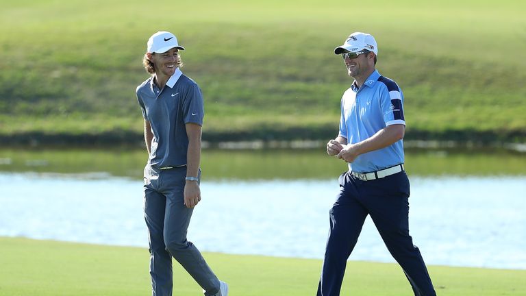 VILAMOURA, PORTUGAL - OCTOBER 20:  Marc Warren of Scotland and Tommy Fleetwood of England (L) have a laugh on the 14th hole during day one of the Portugal 