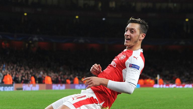 Mesut Ozil celebrates scoring his 2nd and Arsenal's 5th goal against Ludogorets