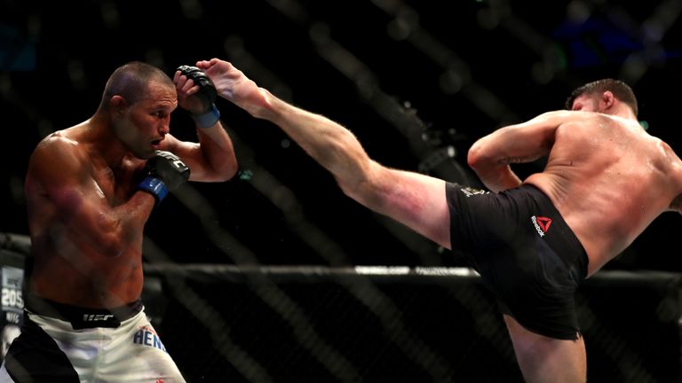 Michael Bisping (right) during his bout against Dan Henderson in the Middleweight Championship of the World of UFC 204 at Manchester Arena. PRESS ASSOCIATI