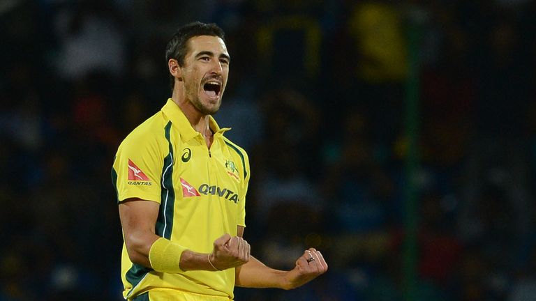 Australia's Mitchell Starc celebrates after he dismissed Sri Lanka's Tillakaratne Dilshan during the first T20 international cricket match between Sri Lank