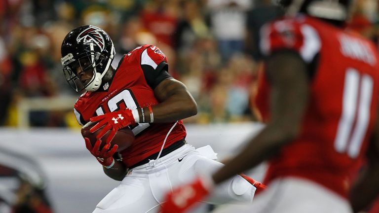 ATLANTA, GA - OCTOBER 30:  Mohamed Sanu #12 of the Atlanta Falcons pulls in the game-tying touchdown against the Green Bay Packers at Georgia Dome on Octob