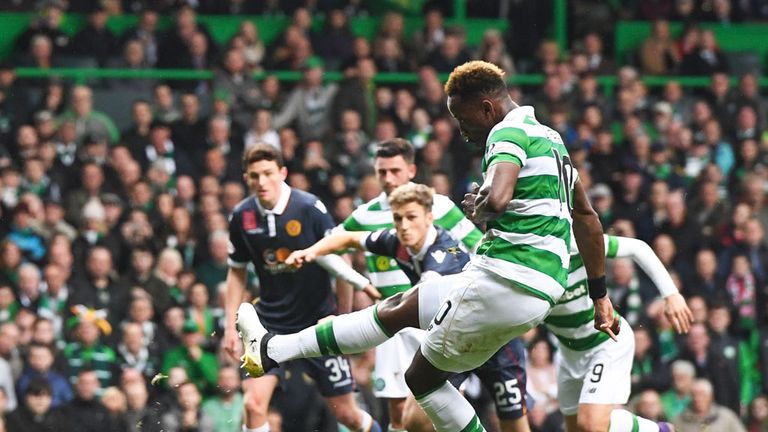 Moussa Dembele scores with his penalty against Motherwell
