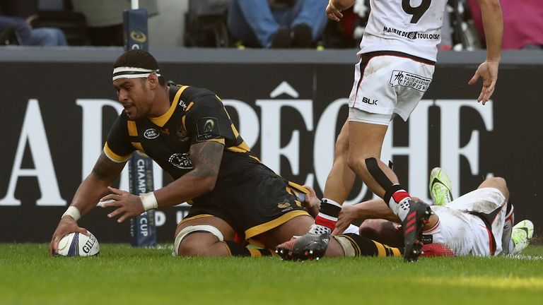 TOULOUSE, FRANCE - OCTOBER 23:  Nathan Hughes of Wasps scores a last minute try during the European Champions Cup match between Toulouse and Wasps at Stade