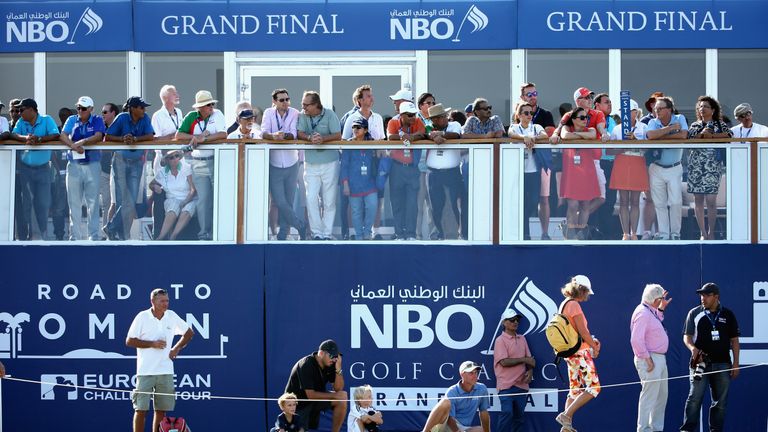 MUSCAT, OMAN - NOVEMBER 07:  Spectators look on from the 18th greenside hospitality during the final round of the NBO Golf Classic Grand Final at the Almou