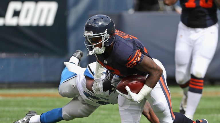 Alshon Jeffery #17 of the Chicago Bears tries to break away from Nevin Lawson #24 of the Detroit Lions