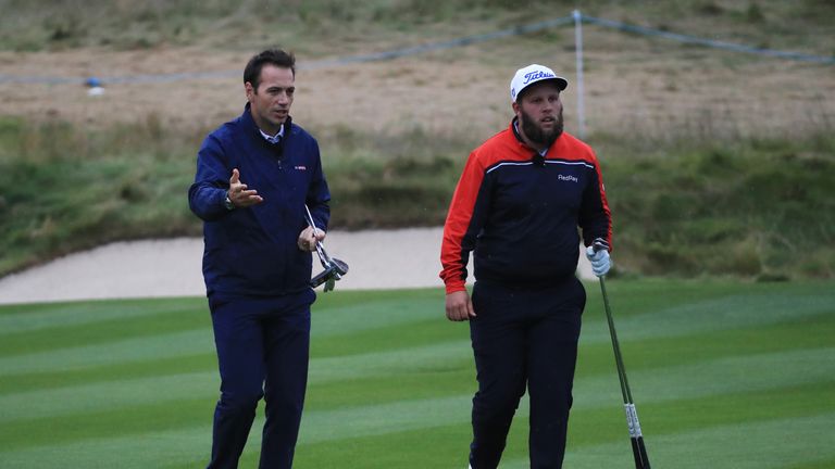 Nick Dougherty and Andrew Johnston demonstrate pitching in the Hero Masterclass during the third round of the British Masters