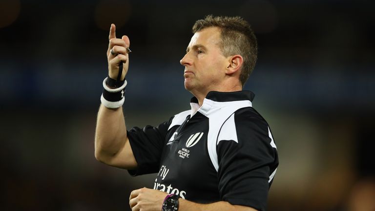 Referee Nigel Owens signals to players during the International Test match between the Wallabies and England  at Allianz Stadium on June 25, 2016