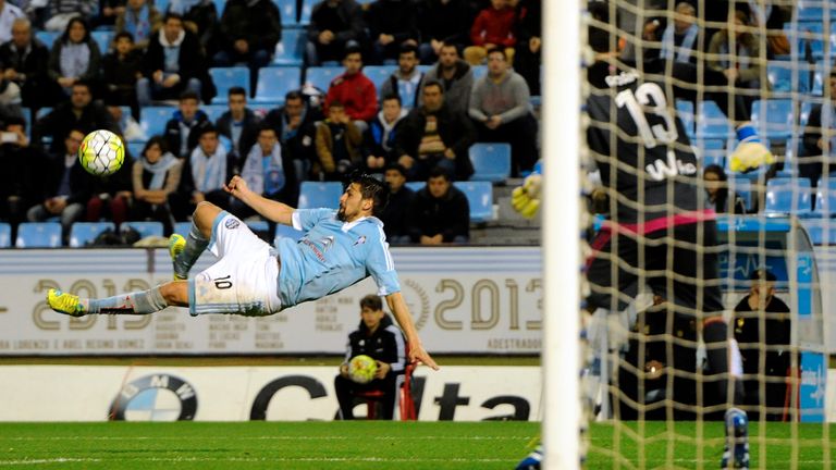 Celta Vigo's forward Nolito tries to kick the ball during the Spanish league football match RC Celta de Vigo vs Real Betis at the Balaidos stadium in Vigo 
