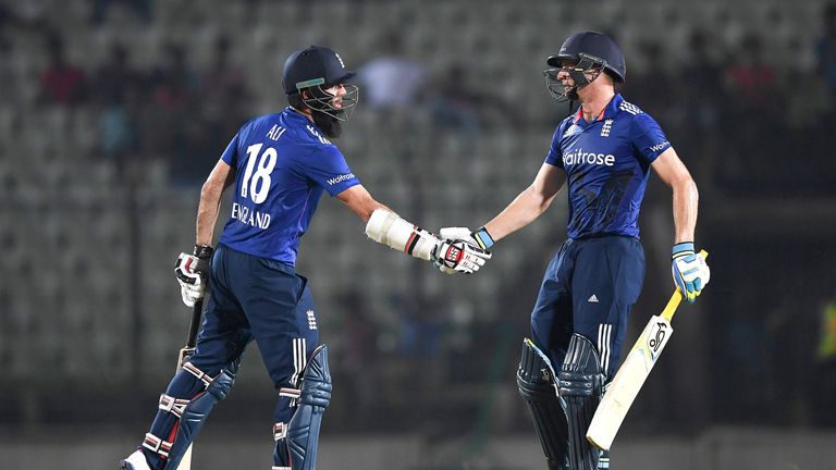 Moeen Ali and Jos Buttler shake hands during the ODI warm up match with Bangladesh