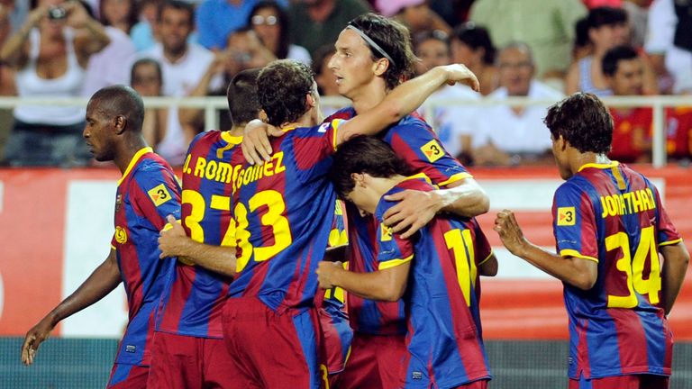 Oriol Romeu (second left) made his Barcelona debut in the Spanish Super Cup in 2010