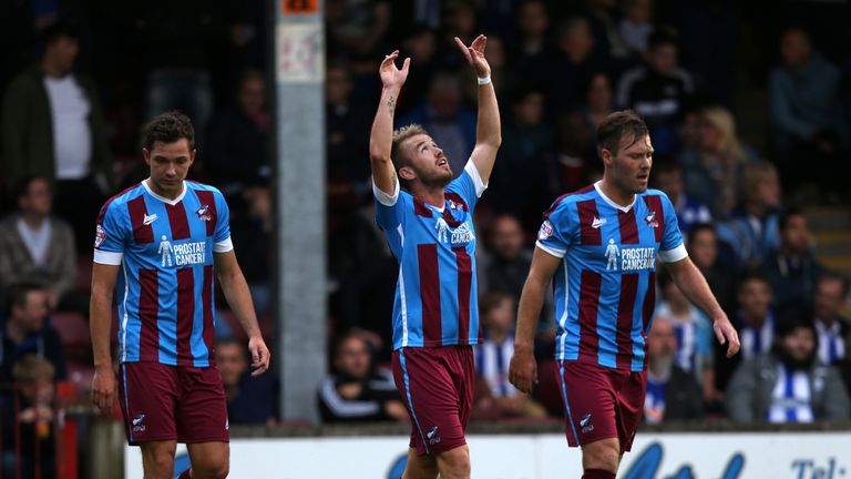 Paddy Madden (centre) scored both of Scunthorpe's goals in their win over MK Dons