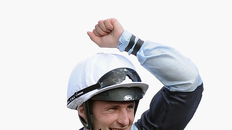 Jockey Stephane Pasquier of France atop Karakontie smiles after winning the 2014 Breeders' Cup Mile at Santa Anita Park