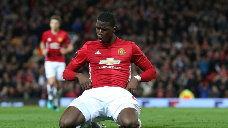 Paul Pogba celebrates after putting Man Utd three goals ahead