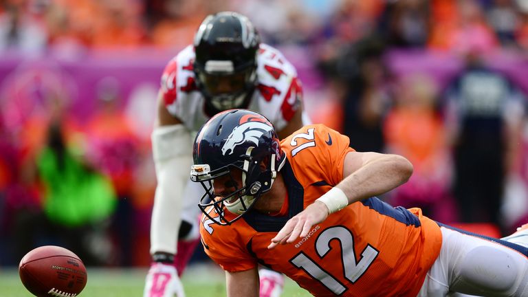 DENVER, CO - OCTOBER 9:  Quarterback Paxton Lynch #12 of the Denver Broncos recovers his own fumble in the second quarter of the game against the Atlanta F